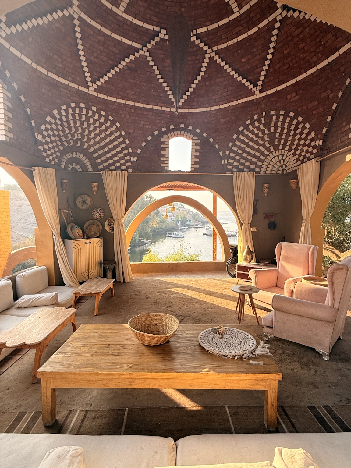 Inside the Love Temple — brick dome, arches, and the Nile beyond, Heisa Island